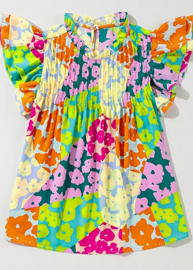 Damebluse med rynket trykk og sommerfugldetaljer 1