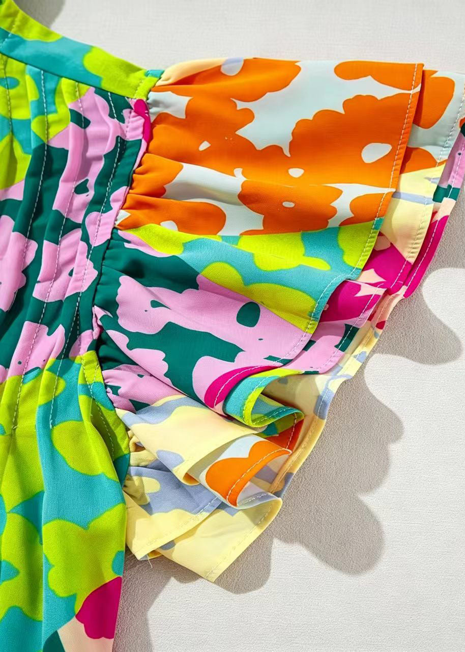 Damebluse med rynket trykk og sommerfugldetaljer 4