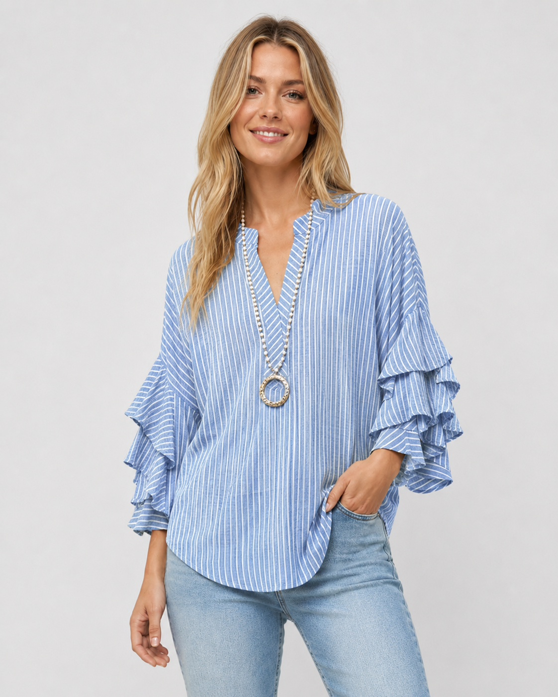 Damebluse med Blomstertrykk og Ruffede Ermer