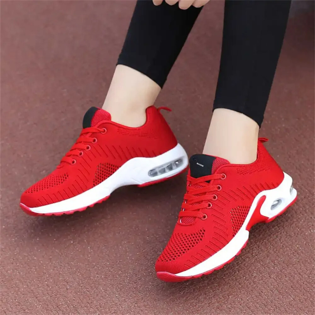 Friidrettssko med støtte i fotbuen for kvinner