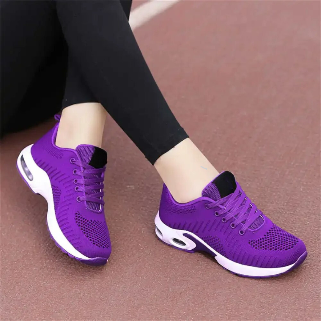 Friidrettssko med støtte i fotbuen for kvinner