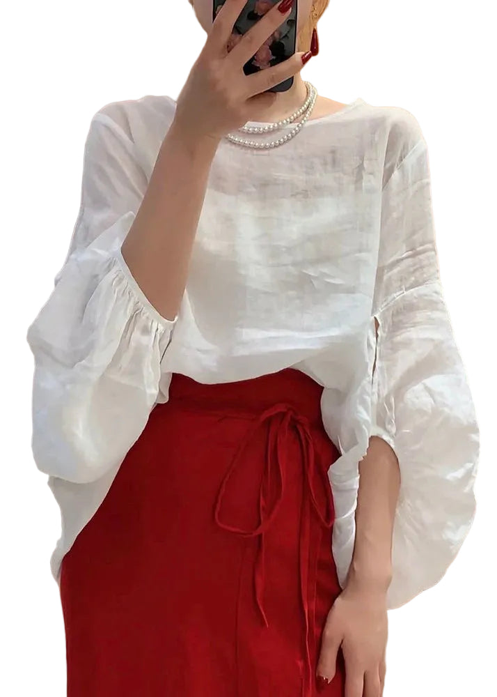 Damebluse med lanternerm og rund hals i klassisk design 0