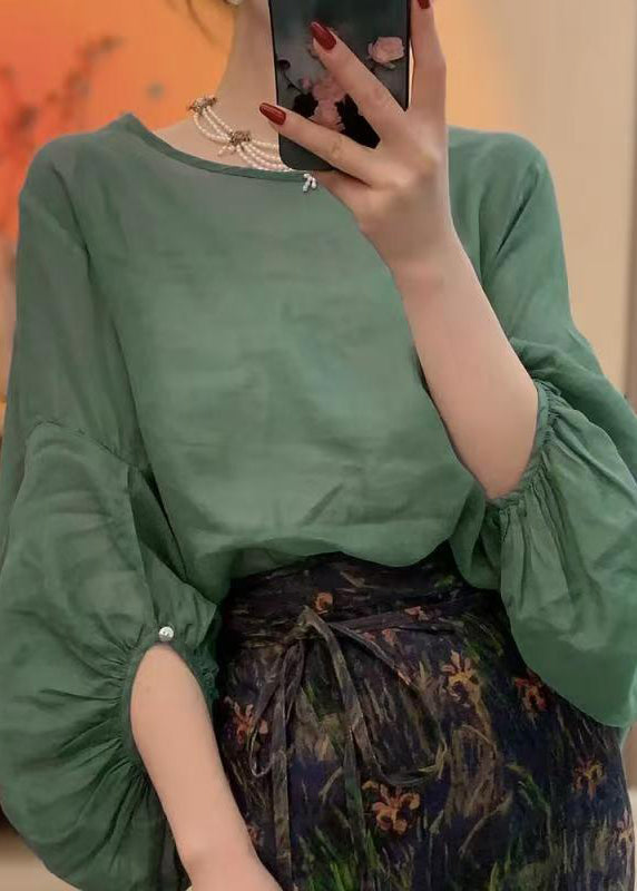 Damebluse med lanternerm og rund hals i klassisk design 3