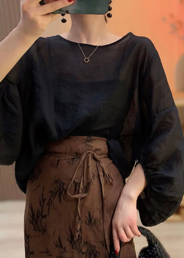 Damebluse med lanternerm og rund hals i klassisk design 4