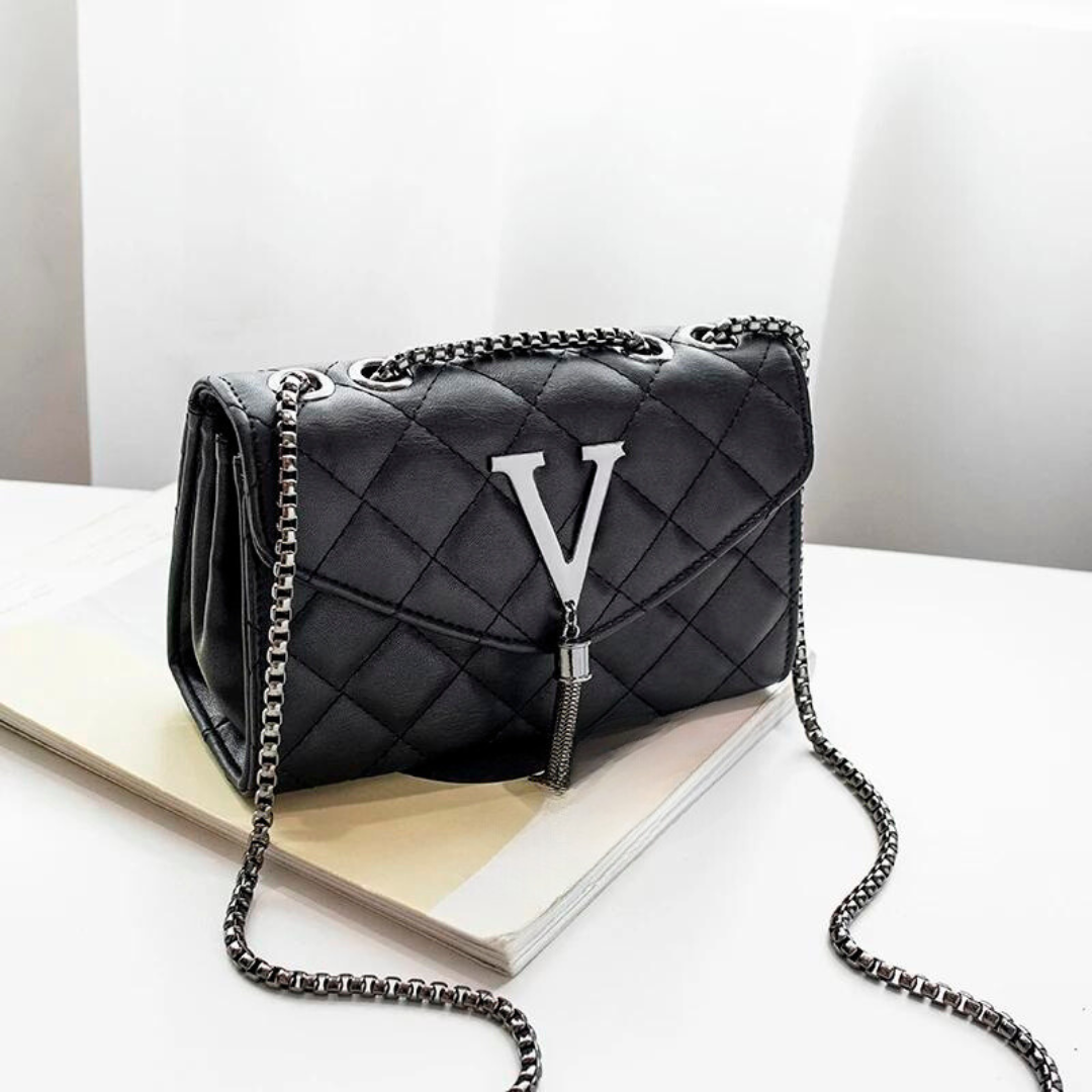 Luksus vattert crossbody veske med dusker