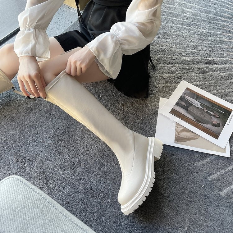 Lange Kunstskinntøvler for kvinner