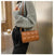 Liten crossbody-veske i skinn for kvinner