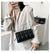Liten crossbody-veske i skinn for kvinner