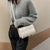 Liten crossbody-veske i skinn for kvinner