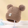 Ull Strikket Baby Bonnet