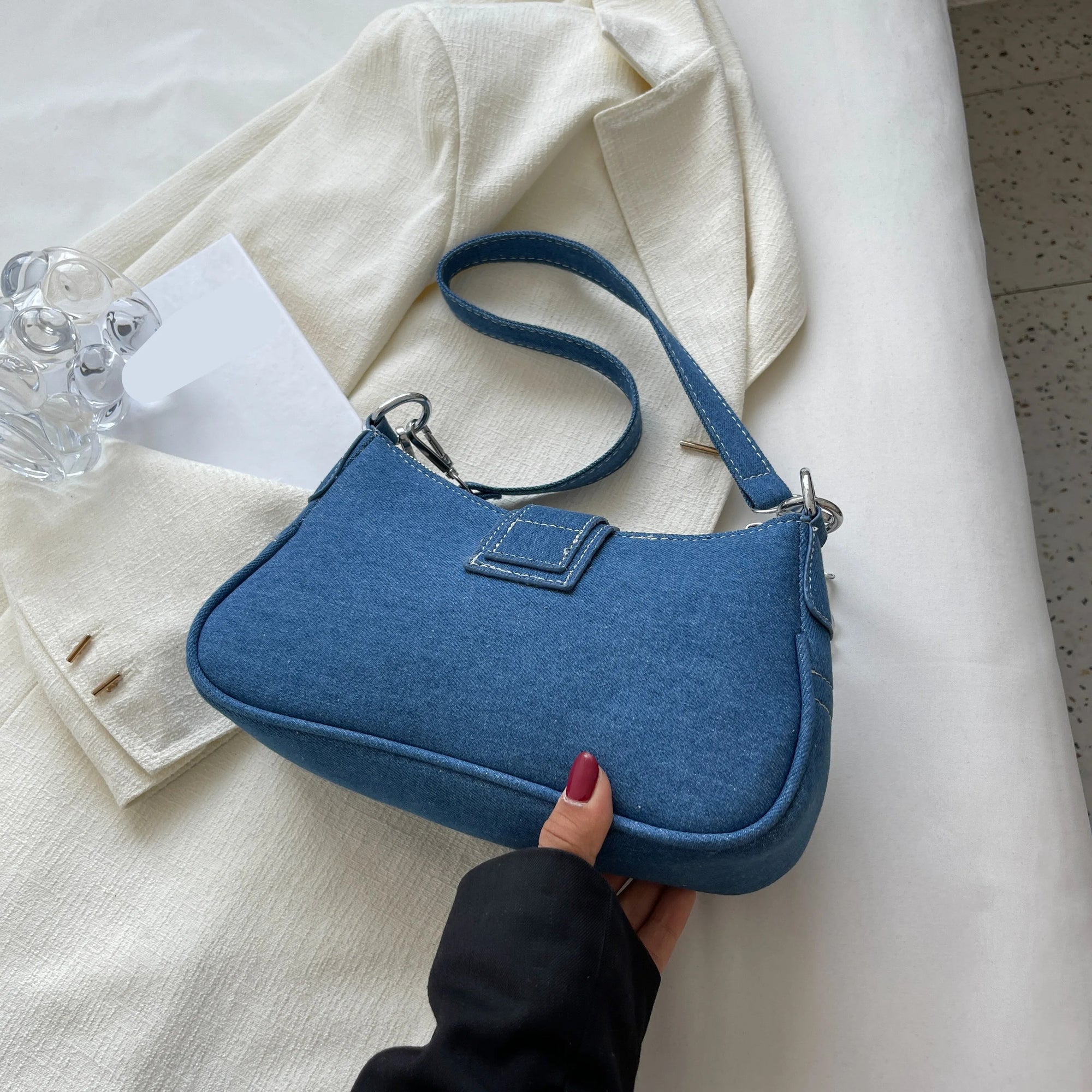 Crossbody-veske i denim for kvinner