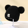 Ull Strikket Baby Bonnet