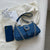 Crossbody-veske i denim for kvinner