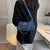 Crossbody-veske i denim for kvinner