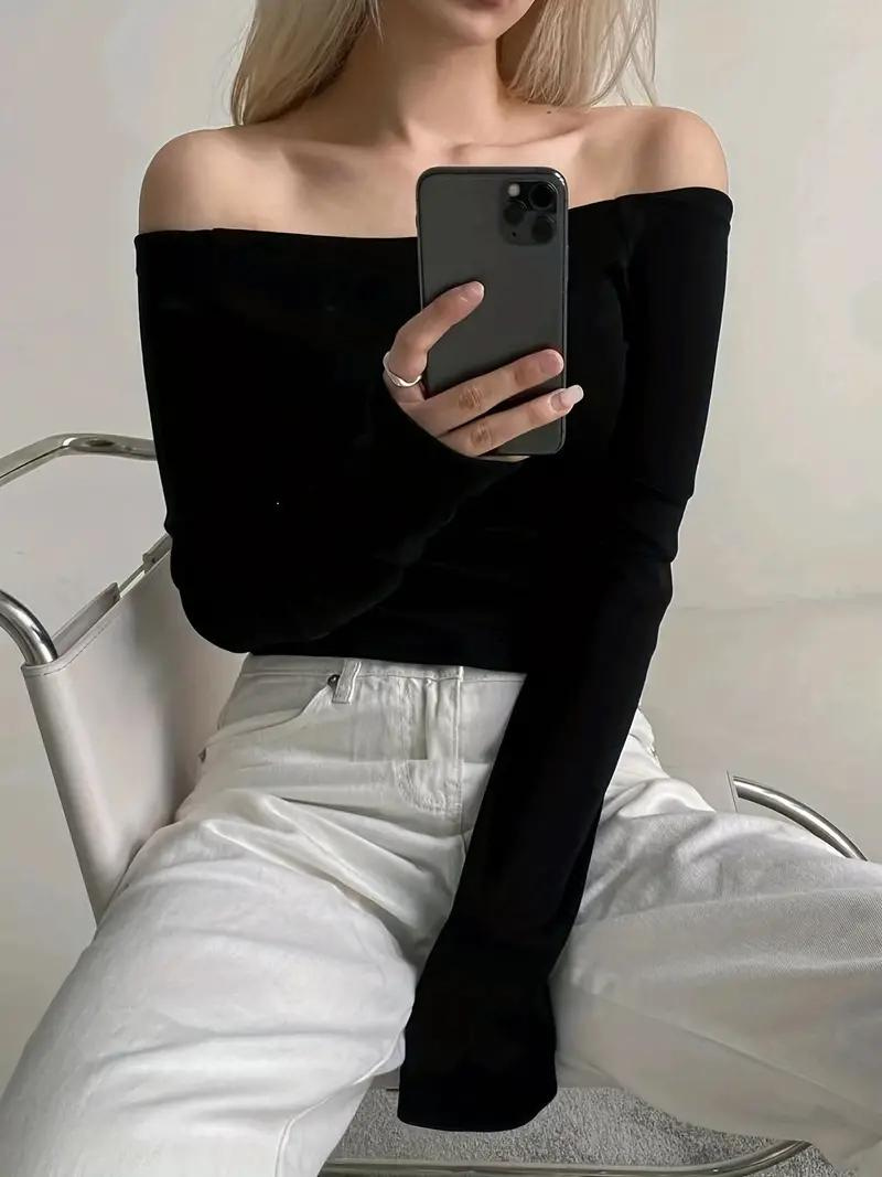 Solide off shoulder topper med lange ermer