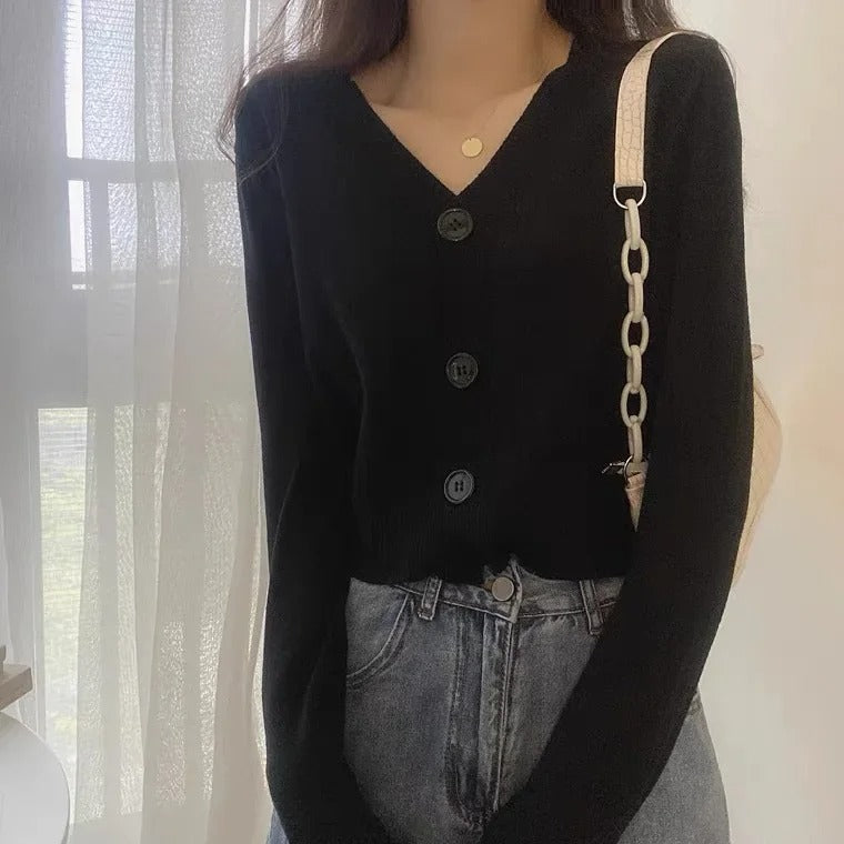 Kabelstrikket cardigan til dame