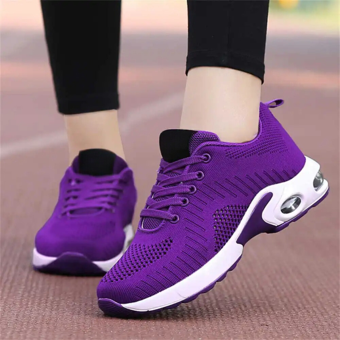 Friidrettssko med støtte i fotbuen for kvinner