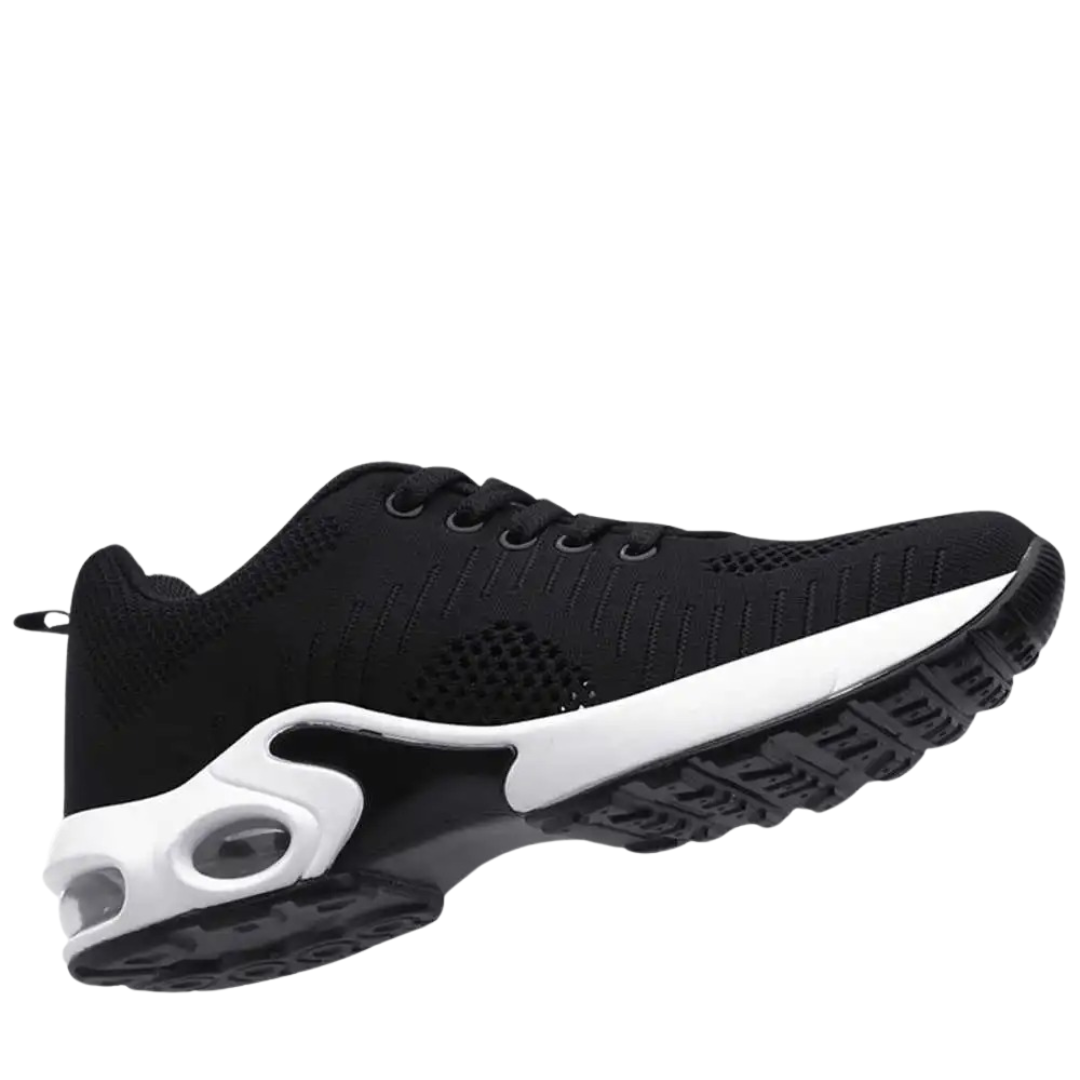 Friidrettssko med støtte i fotbuen for kvinner