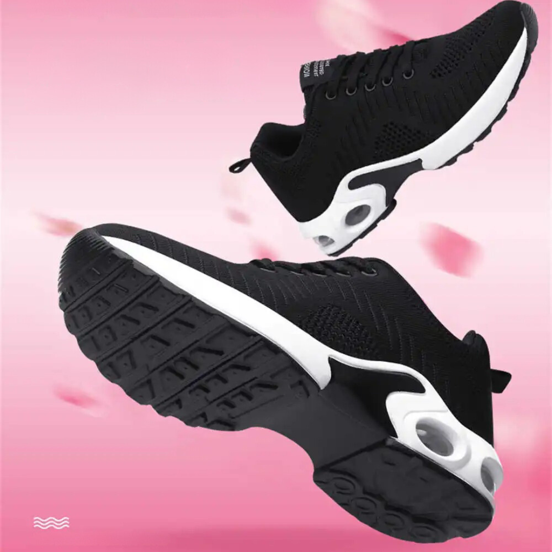 Friidrettssko med støtte i fotbuen for kvinner