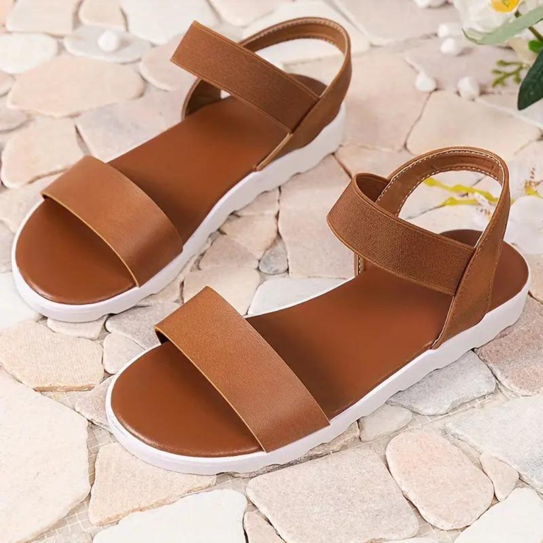 Flate fritidssandaler for kvinner