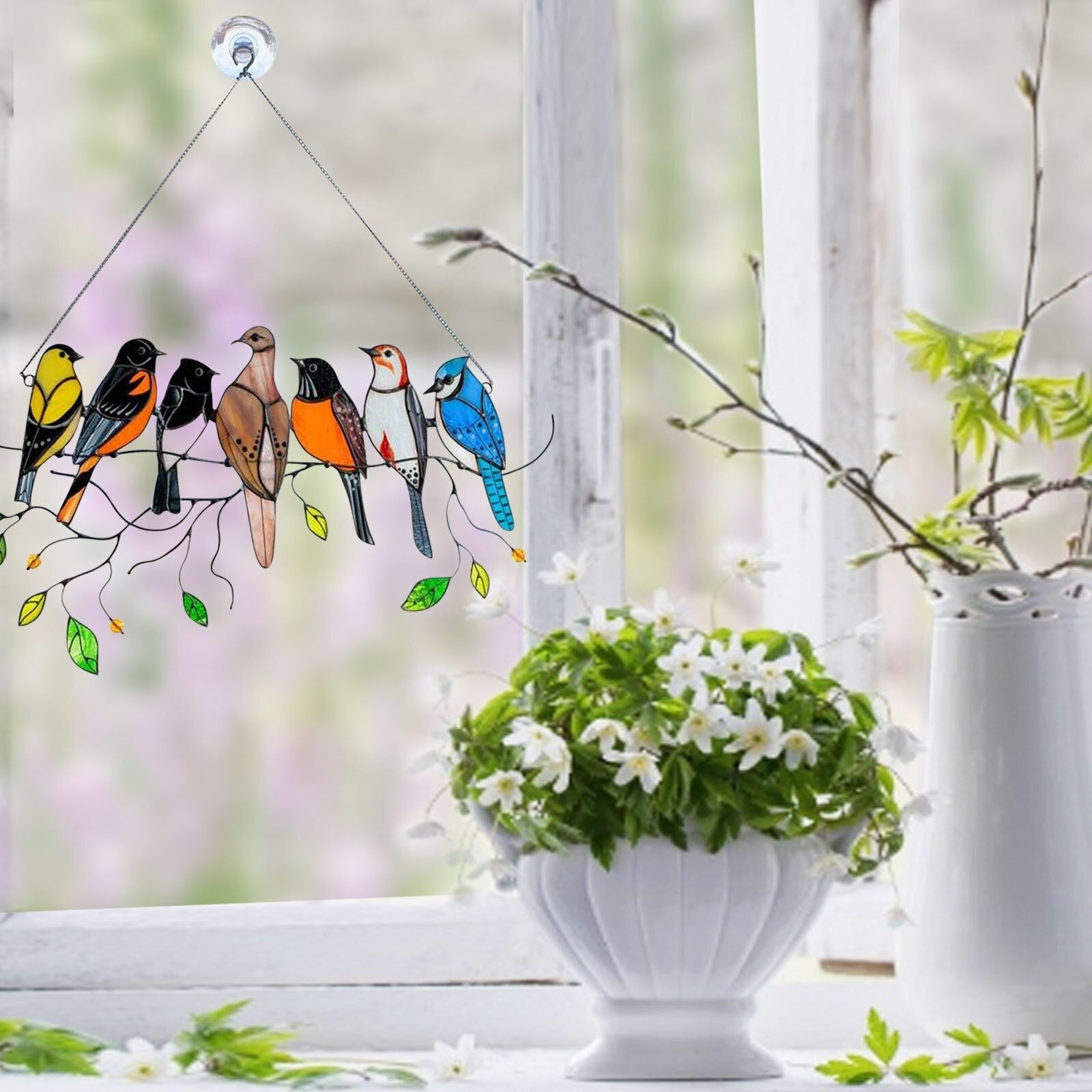 Fuglesolfanger i farget glass