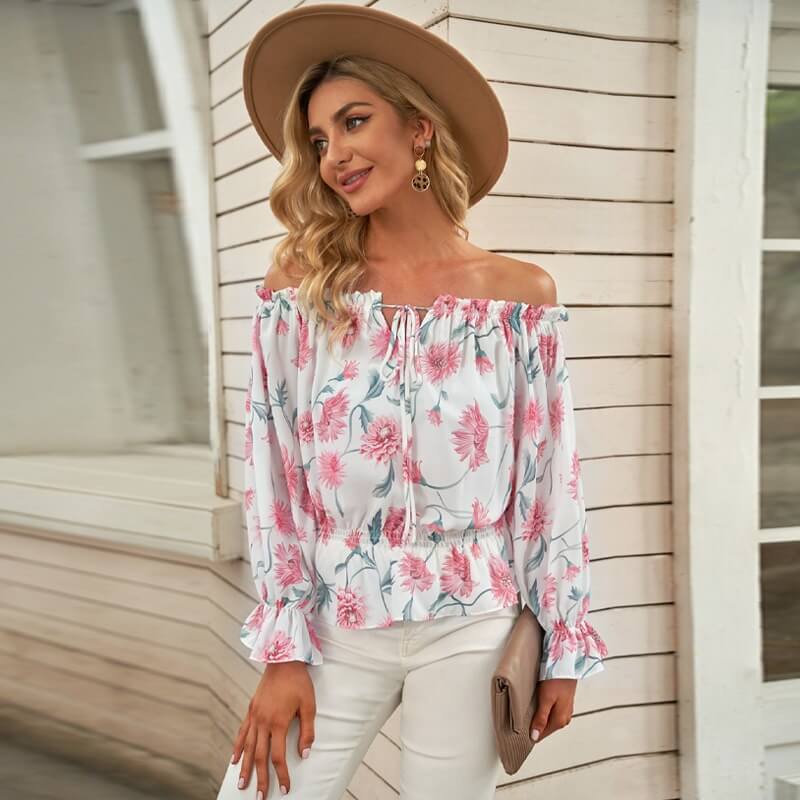 Blomstret bluse med volanger