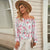 Blomstret bluse med volanger