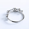 Roter fritt beroligende fidget-ring