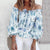 Blomstret bluse med volanger
