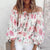 Blomstret bluse med volanger